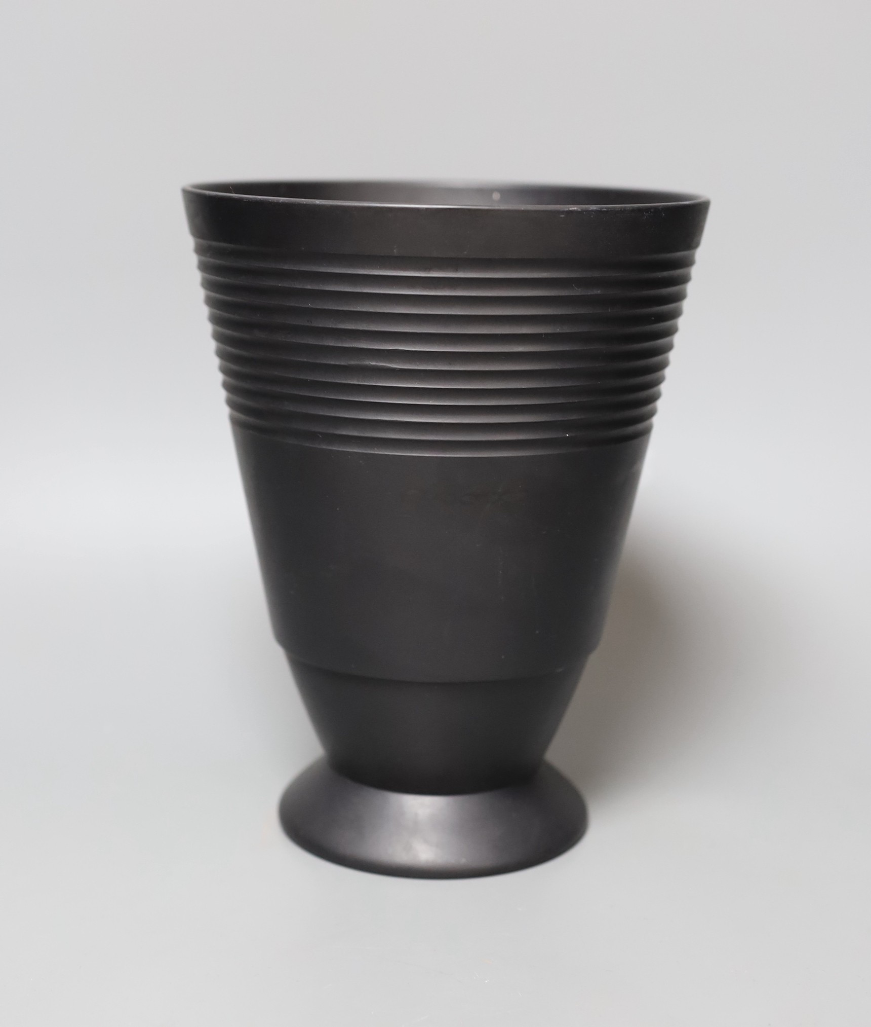 An unusual Keith Murray for Wedgwood vase - flared and ribbed black basalt, 20cm high